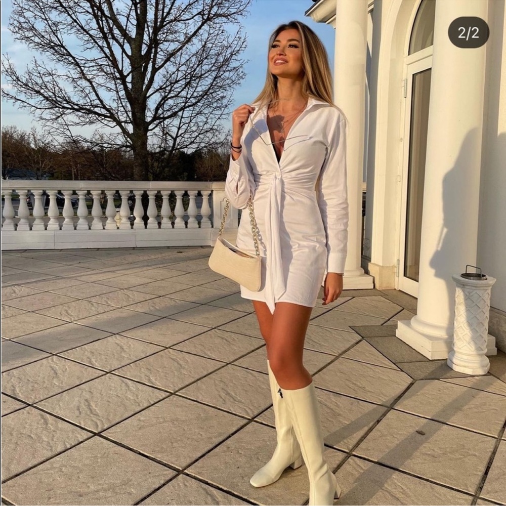 Akira white dress. Deep neckline.